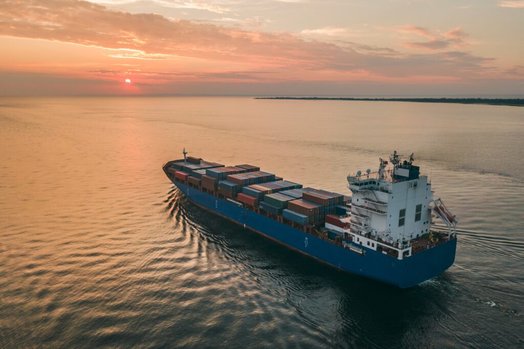 Container ship sailing across the open ocean