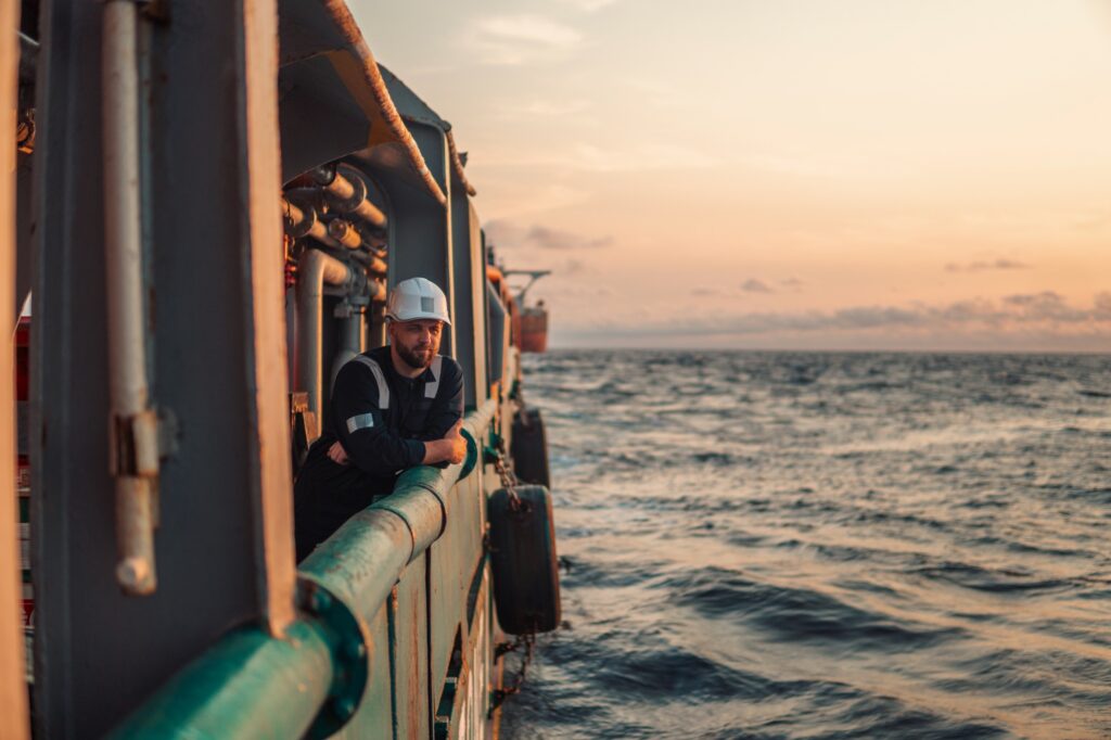 Deck officer on the deck of a cargo ship Deck officer on the deck of a cargo ship